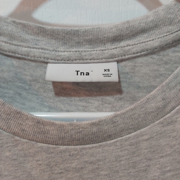 Aritzia gray tna top with red and blue striped sleeves. Size XS - Picture 2 of 5